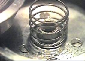 Разборка фотоаппарат Киев-4, возвратная пружина кнопки спуска, головка взвода