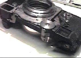 Разборка фотоаппарат Киев-4, декоративная панель; пластины, крепящие призму дальномера